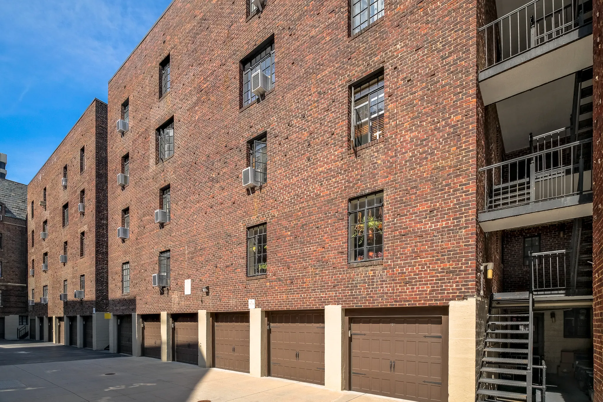 The back of the Broadlawn building and resident garages.